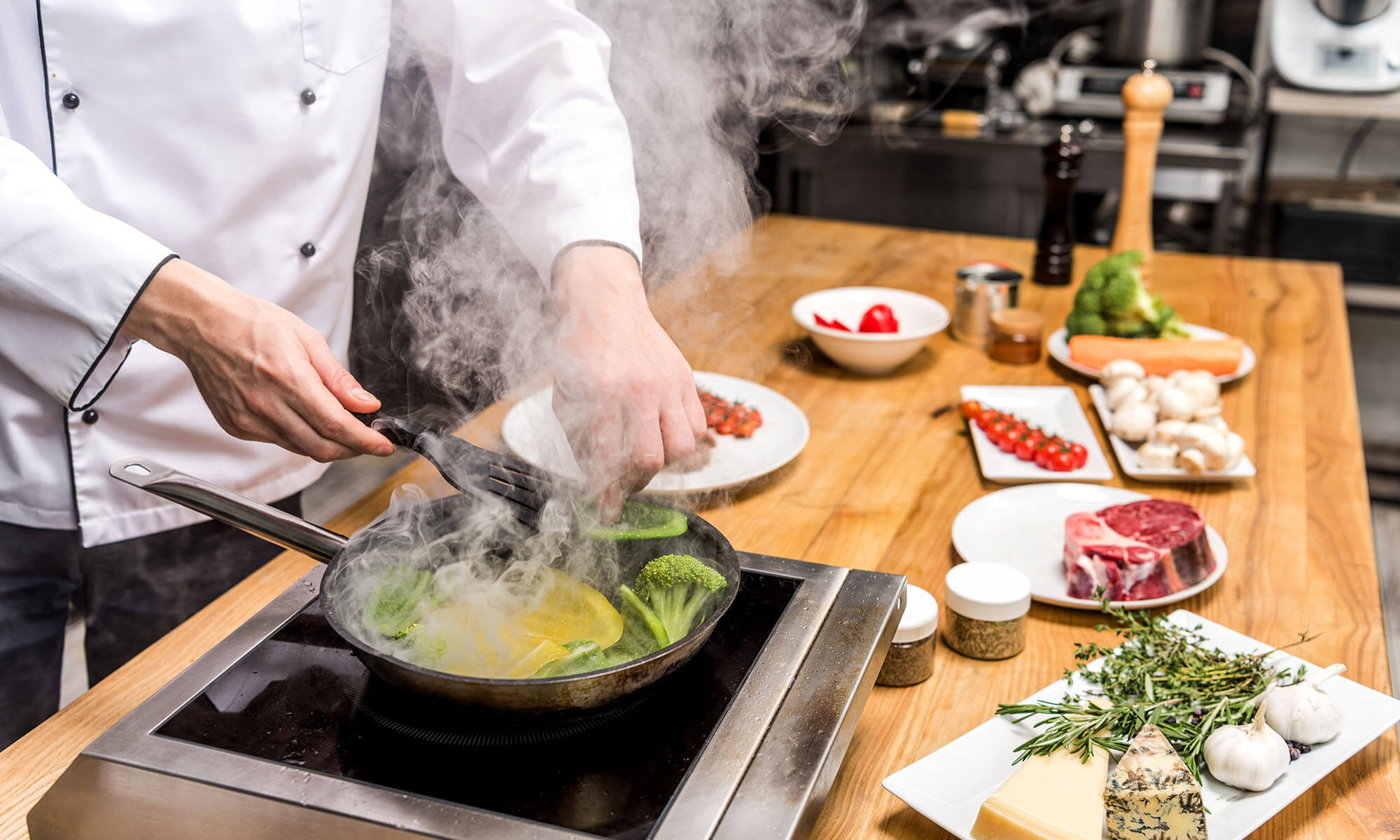 cropped-image-of-chef-frying-yellow-and-green-bell-2026-